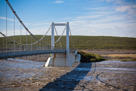 The bridge over Icelandic river Jokulsa a Fjollum. Horizontal shotの写真素材