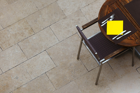 Outdoor summer cafe tables with chairs. View from above. Copy space