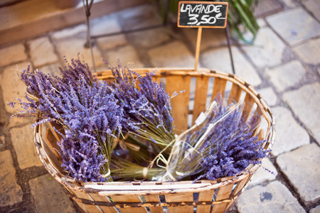 Lavender bunches selling in an outdoor french market. Horizontal shot with selective focusの写真素材