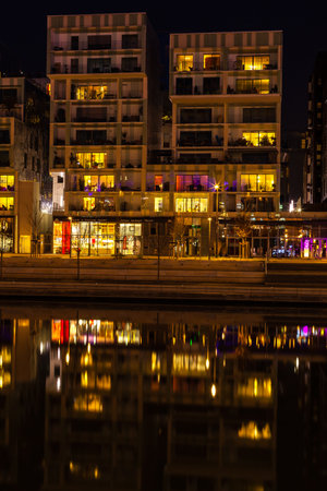 FRANCE, LYON - FEBRUARY 19: The Confluence District in Lyon, France on February 19, 2013. New district with an modern architecture in the place of the old port. Night shotのeditorial素材