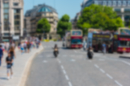 Blur defocused shot of Paris street with people and carsの写真素材