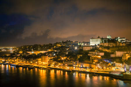 Overview of Old Town of Porto, Portugal at night. Ribeira and Douro riverの写真素材