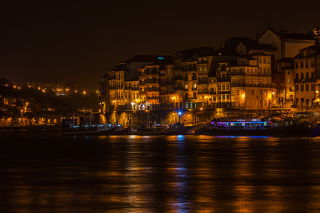 Overview of Old Town of Porto, Portugal at night. Ribeira and Douro riverの写真素材