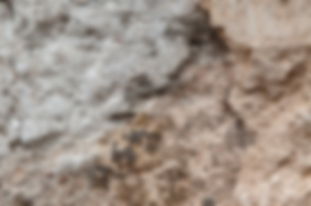 Defocused old gray plaster wall background. horizontal blur shotの写真素材