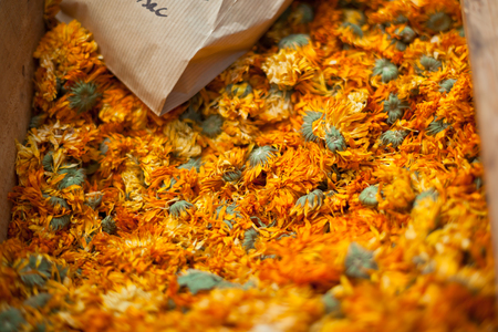 Dry marigold heap on a french farmers market. Close Up with small GRIP and selective focusの写真素材