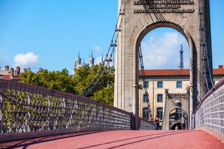 FRANCE, LYON - AUGUST 22: People are walking along Old Passerelle du College bridge over Rhone river in Lyon, France on August 22, 2014のeditorial素材