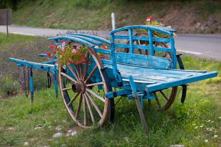 Blue Decorative wooden cart in a farmland of Franceの写真素材