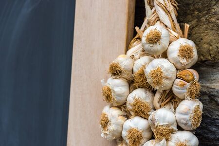 Garlic bunches in a farmers market. Shot with a selective focusの写真素材