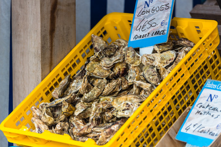 Oysters market in Cancale, Brittany, France. Shot with a selective focusの写真素材