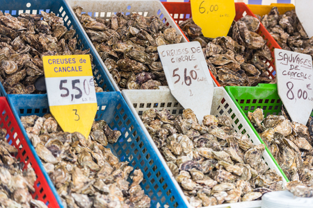 Oysters market in Cancale, Brittany, France. Shot with a selective focusの写真素材