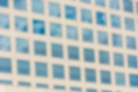 Defocused windows of modern office buildingの写真素材