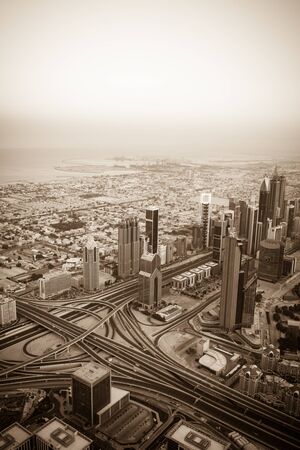 Dubai downtown morning scene. Top view from above. Sepia toned shotの写真素材