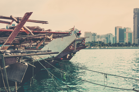Old fishing boats with rusty metal nets in the Persian Gulf. Filtered shotの写真素材