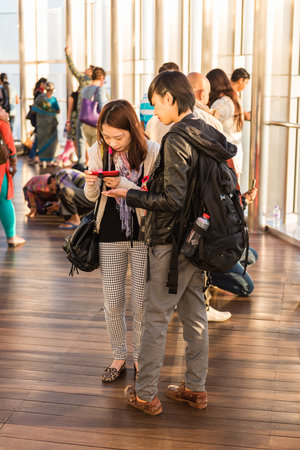 DUBAI, UAE - JANUARY 02: people at the top the observation deck of the highest building in the world Burj al Khalifa on January 02, 2015 in Dubai, United Arab Emiratesのeditorial素材