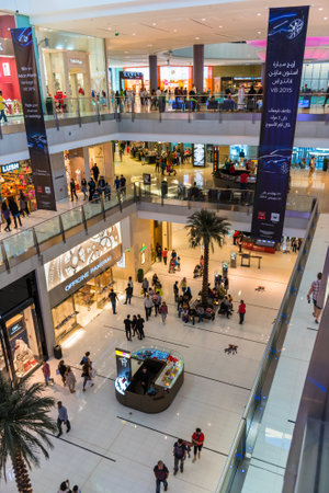 UAE, DUBAI - DECEMBER 25: people do shopping in Dubai Mall store center on December 25, 2014のeditorial素材