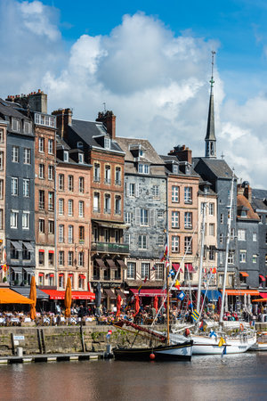 FRANCE, HONFLEUR - MAY 30: Honfleur harbour in Normandy, France. Color houses and their reflection in water on May 30, 2015のeditorial素材