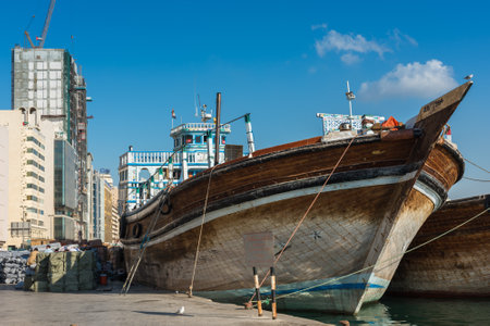 UAE, DUBAI - DECEMBER 27: traditional arabic cargo boats at Dubai creek on December 27, 2014
