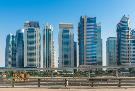 UAE, DUBAI - DECEMBER 31: view of Jumeirah Lakes Towers  and metro bridge in Dubai, United Arab...
