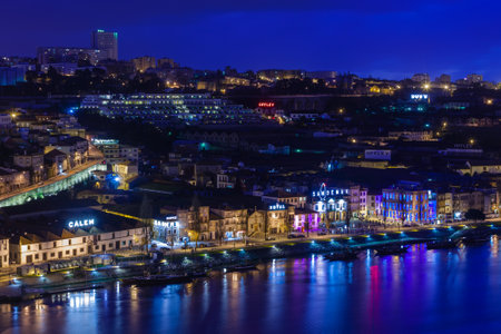 PORTUGAL, PORTO - JANUARY 20: Overview of Vila Nova de Gaia, district of Porto, Portugal at night on January 20, 2013. The world famous Port wine is stored here.のeditorial素材