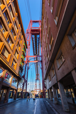 SPAIN, PORTUGALETE - JANUARY 04: The Bizkaia suspension transporter bridge (Puente de Vizcaya) in Portugalete, Spain on January 04, 2013. The Bridge crossing the mouth of the Nervion River.のeditorial素材