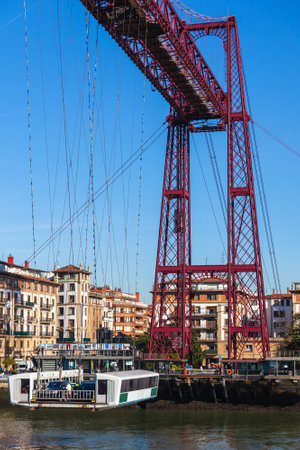 The Bizkaia suspension transporter bridge (Puente de Vizcaya) in Portugalete, Spain. The Bridge crossing the mouth of the Nervion River.のeditorial素材