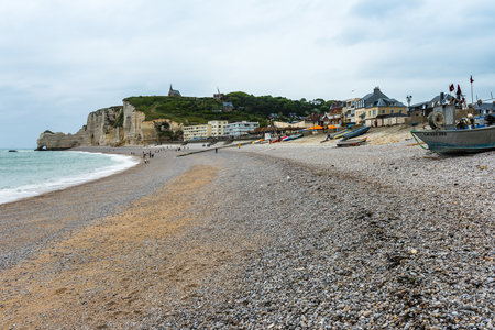 FRANCE, ETRETAT - MAY 29: view of the beach and fishing boats in Etretat, France on May 29, 2015. Bad weatherのeditorial素材