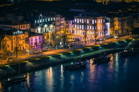 PORTUGAL, PORTO - JANUARY 20: Overview of Vila Nova de Gaia, district of Porto, Portugal at night on...