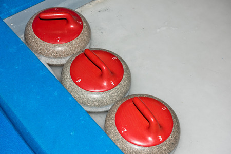 Equipment for curling sport game the iceの写真素材