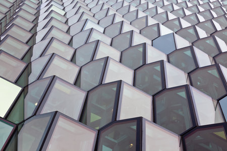 Detail of the glass facade of the Harpa Concert Hall in Reykjavik, Iceland.のeditorial素材