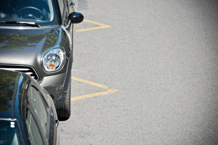 FRANCE, PARIS - JUNE 06: Cars parked on the street of Paris, France on June 06, 2015