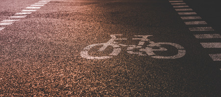 Bicycle road sign on the asphalt streetの写真素材