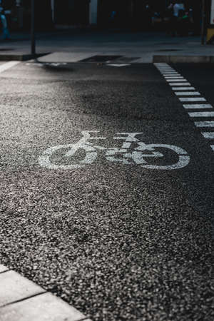 Bicycle road sign on the asphalt streetの写真素材