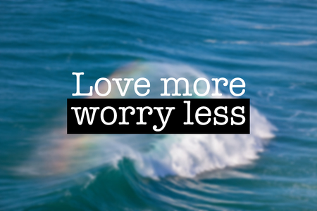 Inspirational motivation quote with phrase Love more worry less, Giant Ocean Wave background