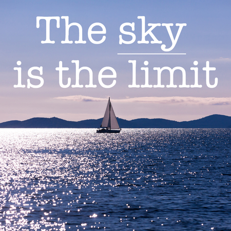 Inspirational motivation quote with phrase "The sky is the limit", Beautiful blue seascape yacht backgroundの写真素材