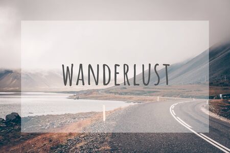Inspirational typographic quote wanderlust. Travel vacations tourism adventure road trip conceptの写真素材