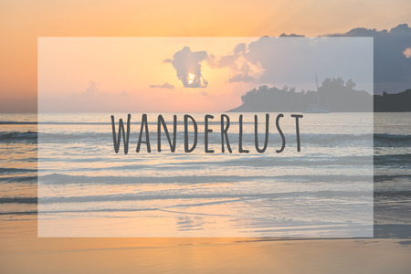 Inspirational typographic quote wanderlust. Travel vacations tourism adventure road trip conceptの写真素材