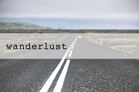 Inspirational typographic quote wanderlust. Travel vacations tourism adventure road trip conceptの写真素材