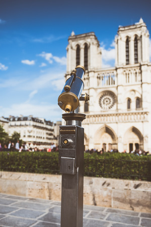 Telescope overlooking for Cathedral of Notre Dame in Parisの写真素材