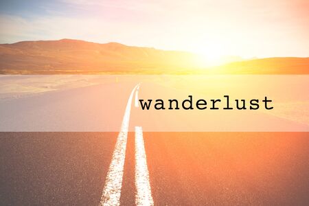 Inspirational typographic quote wanderlust. Travel vacations tourism adventure road trip conceptの写真素材