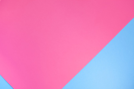 Blue and pink pastel color paper geometric flat lay background textureの写真素材