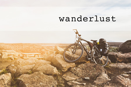 Inspirational typographic quote wanderlust. Travel vacations tourism adventure road trip conceptの写真素材