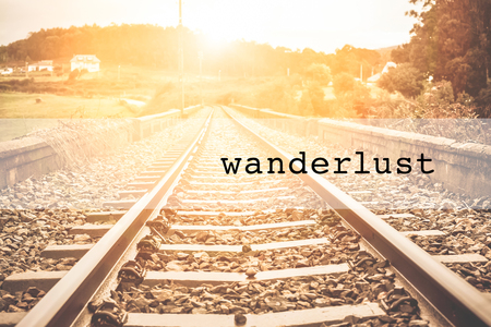 Inspirational typographic quote wanderlust. Travel vacations tourism adventure road trip conceptの写真素材