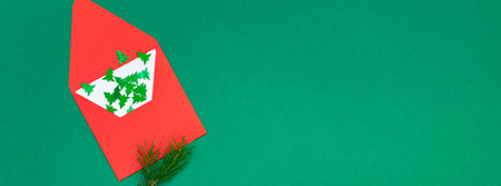 New Year or Christmas top view Xmas holiday celebration red envelope letter copy space green color...