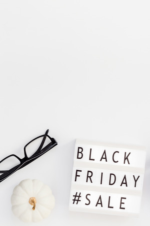 Creative Top view flat lay promotion composition Black friday sale text on lightbox white background copy space Template Black friday sale mockup fall thanksgiving promotion advertisingの写真素材