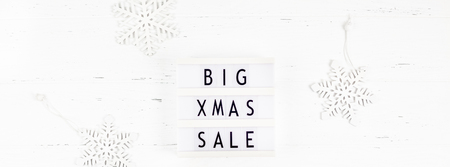 Creative Top view flat lay promotion composition Big Xmas sale text lightbox white wooden background copy space Template seasonal winter christmas offer promotion advertising scandinavian minimalismの写真素材