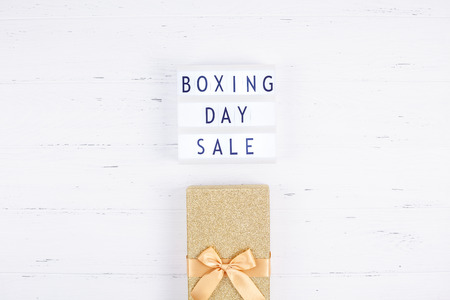 Creative Top view flat lay promotion composition Boxing day sale text on lightbox white background copy space Template Boxing day sale mockup winter christmas seasonal offer promotion advertisingの写真素材