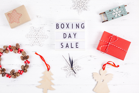 Creative Top view flat lay promotion composition Boxing day sale text on lightbox white background copy space Template Boxing day sale mockup winter christmas seasonal offer promotion advertisingの写真素材