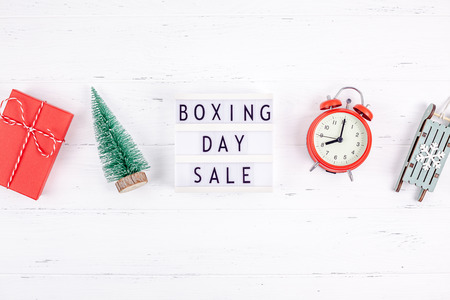 Creative Top view flat lay promotion composition Boxing day sale text on lightbox white background copy space Template Boxing day sale mockup winter christmas seasonal offer promotion advertisingの写真素材