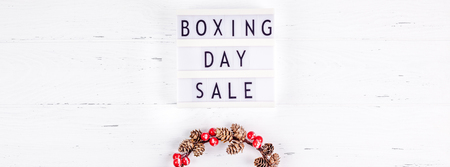 Creative Top view flat lay promotion composition Boxing day sale text on lightbox white background copy space Template Boxing day sale mockup winter christmas seasonal offer promotion advertisingの写真素材