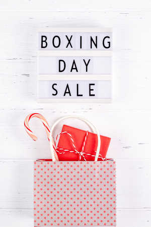 Creative Top view flat lay promotion composition Boxing day sale text on lightbox white background copy space Template Boxing day sale mockup winter christmas seasonal offer promotion advertisingの写真素材
